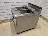 an image of a commercial fryer sitting on top of a counter