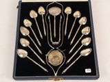 a box with silver spoons and spoon spoons in it