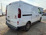 a white van that is parked in a lot