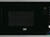 a picture of a black and silver microwave with the door open