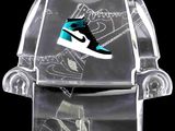 a clear plastic chair with a pair of shoes on it