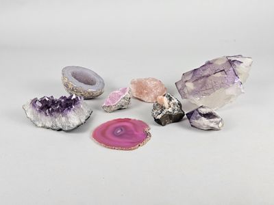 several pieces of amethorate, amethorate and amethorate on a white surface
