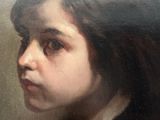 portrait of a young girl in a black dress with a white collar