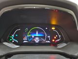 a close up of a car dashboard with a speedometer