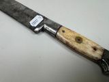 a knife that is sitting on a table