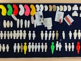 a shadow box with many different types of people in it