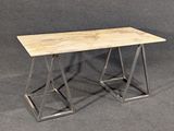 a wooden table with metal legs on a gray background