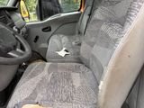 a dirty seat in the back of a truck