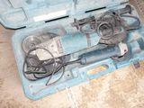 a tool in a case that is sitting on the floor