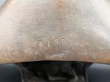 an image of a close up of a metal sculpture of a man ' s head