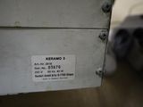 a close up of a metal box with a label on it