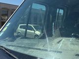 a white van that is parked in a parking lot