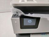 a printer that is sitting on top of a printer