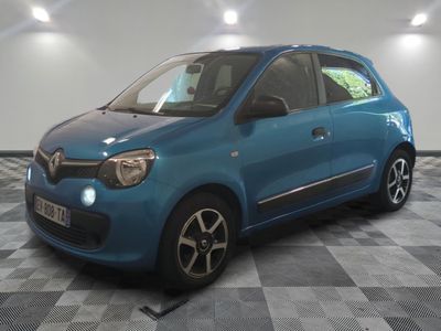 a picture of a blue car parked in a garage