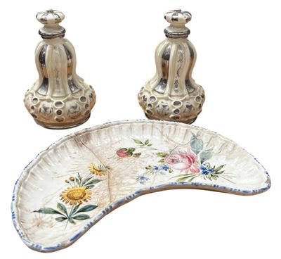 a white plate with a flower design on it