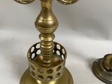 pair of antique brass candelabs with ornate design