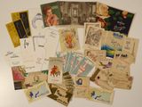 a lot of old postcards on the table