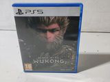 a close up of a video game on a table with a blurry background