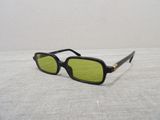 sunglasses on a table with a white background