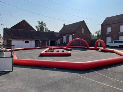 a large inflatable area in the middle of a parking lot