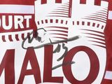 a close up of a red and white shirt with a picture of a man in a cowboy hat