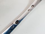 a pair of scissors sitting on a white surface