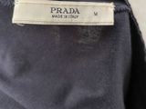 the label on the back of a prada jacket