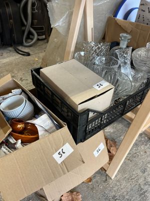 many boxes of items that are sitting on the floor