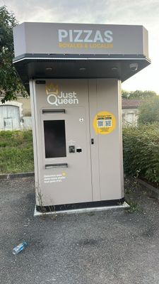 a machine that is sitting in the middle of a parking lot