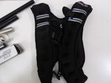 a pair of gloves and a gun on a table