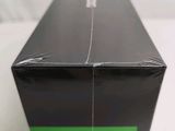 a black box with a green stripe on it