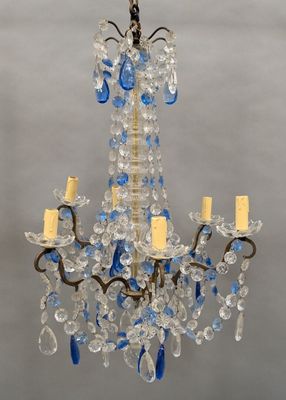 an image of a chandelier with blue and clear glass beads