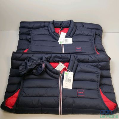 a group of three jackets sitting on top of each other