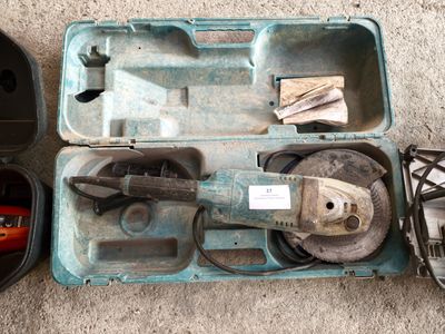 a tool box with tools in it sitting on the floor