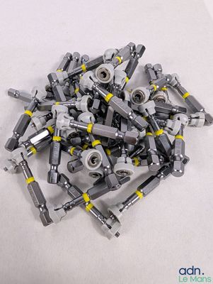 a pile of legos sitting on a white surface