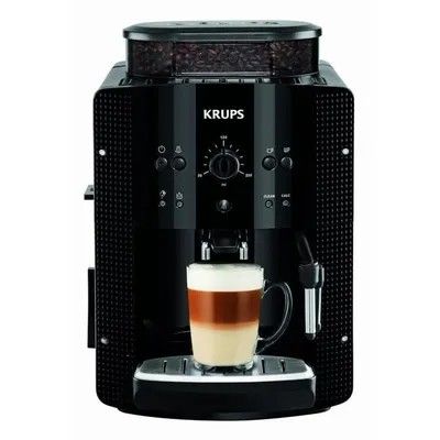gros plan d'une machine à café avec une tasse de café