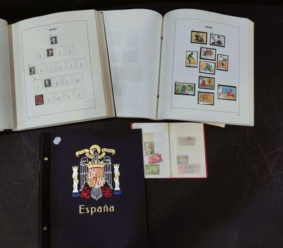 an open book with a picture of a coat of arms on it