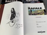 an open book with a drawing of a woman holding a tennis racquet