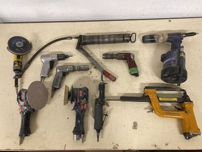 a lot of tools that are laying out on the table