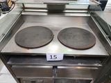 a picture of a stove top with two pans on it