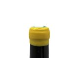 a bottle of wine that is sitting on a table