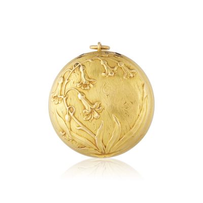 an image of a gold locke with a picture of a woman on it
