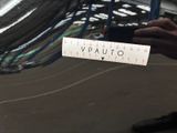 a person taking a picture of a skateboard on a ramp