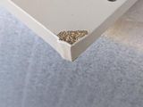 a close up of a piece of white paper on a table