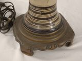 a lamp that is sitting on a table next to a cord
