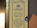a sign on the door of a building that says champagne de vendoge