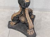a small table with a clock on top of it