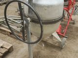 a large tank sitting in the middle of a construction site