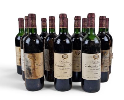 six bottles of wine are lined up on a white surface