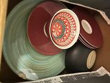 many plates and bowls in a box together